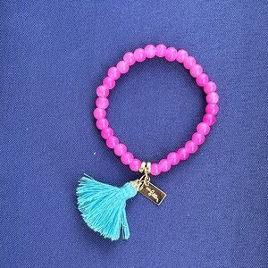 Lilly Pulitzer Vibrant Pink Bracelet with Blue Tassel
